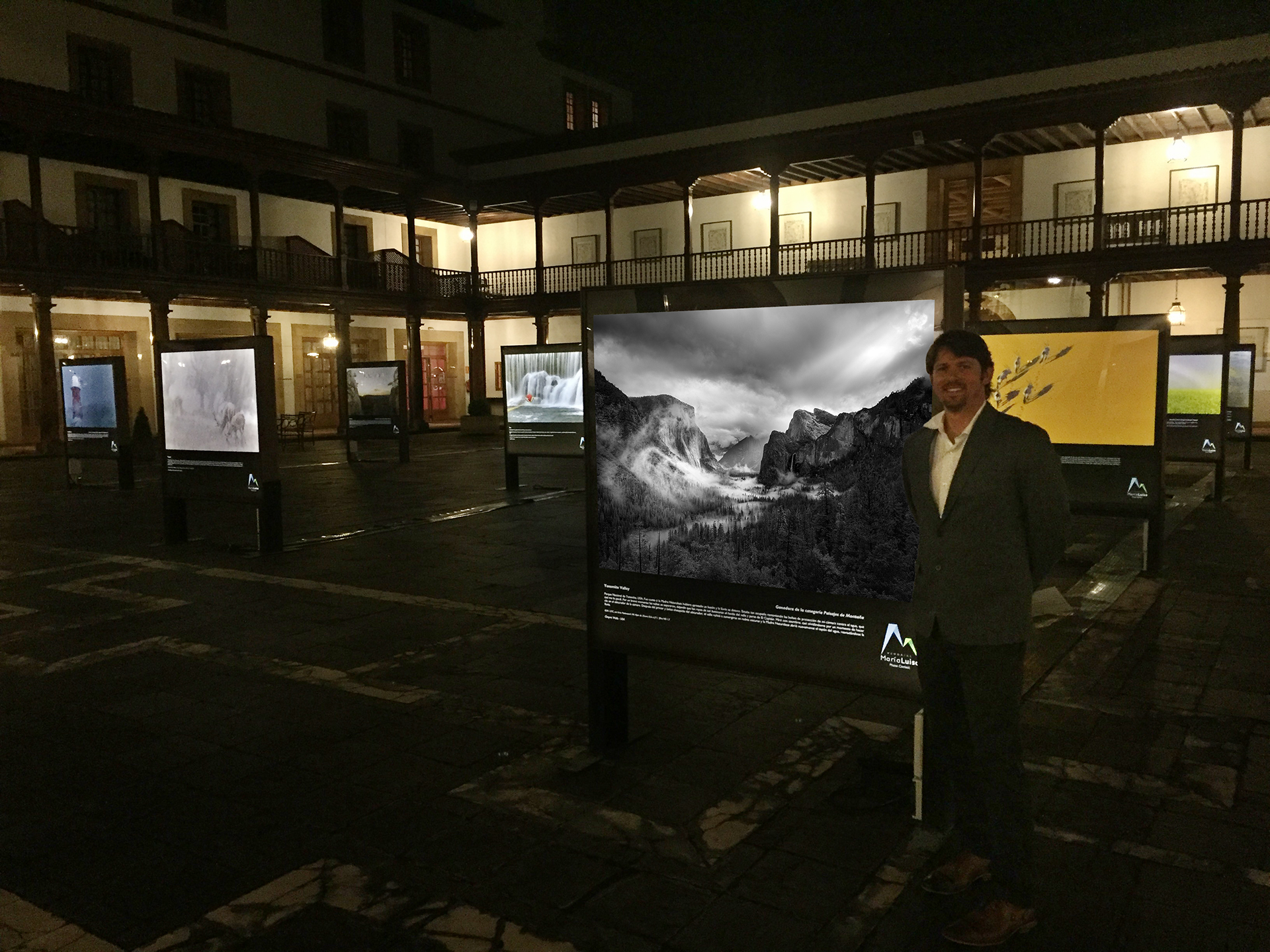 Cheyne Walls accepting a prestigious photography award in Europe, for his nature photograph from Yosemite Valley.