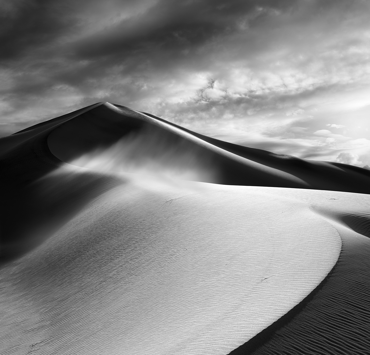 Black and White photograph of the Death Valley sand dunes.