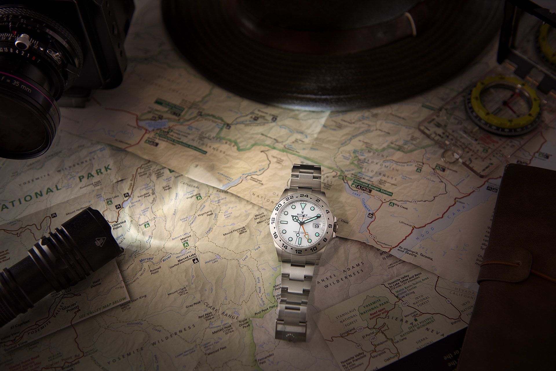 Always with his trusted Rolex Explorer II, an explorer plans the next adventure. Rolex Watch