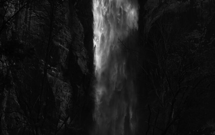 An epic fine art black and white photograph of Bridalveil Fall in Yosemite National Park.