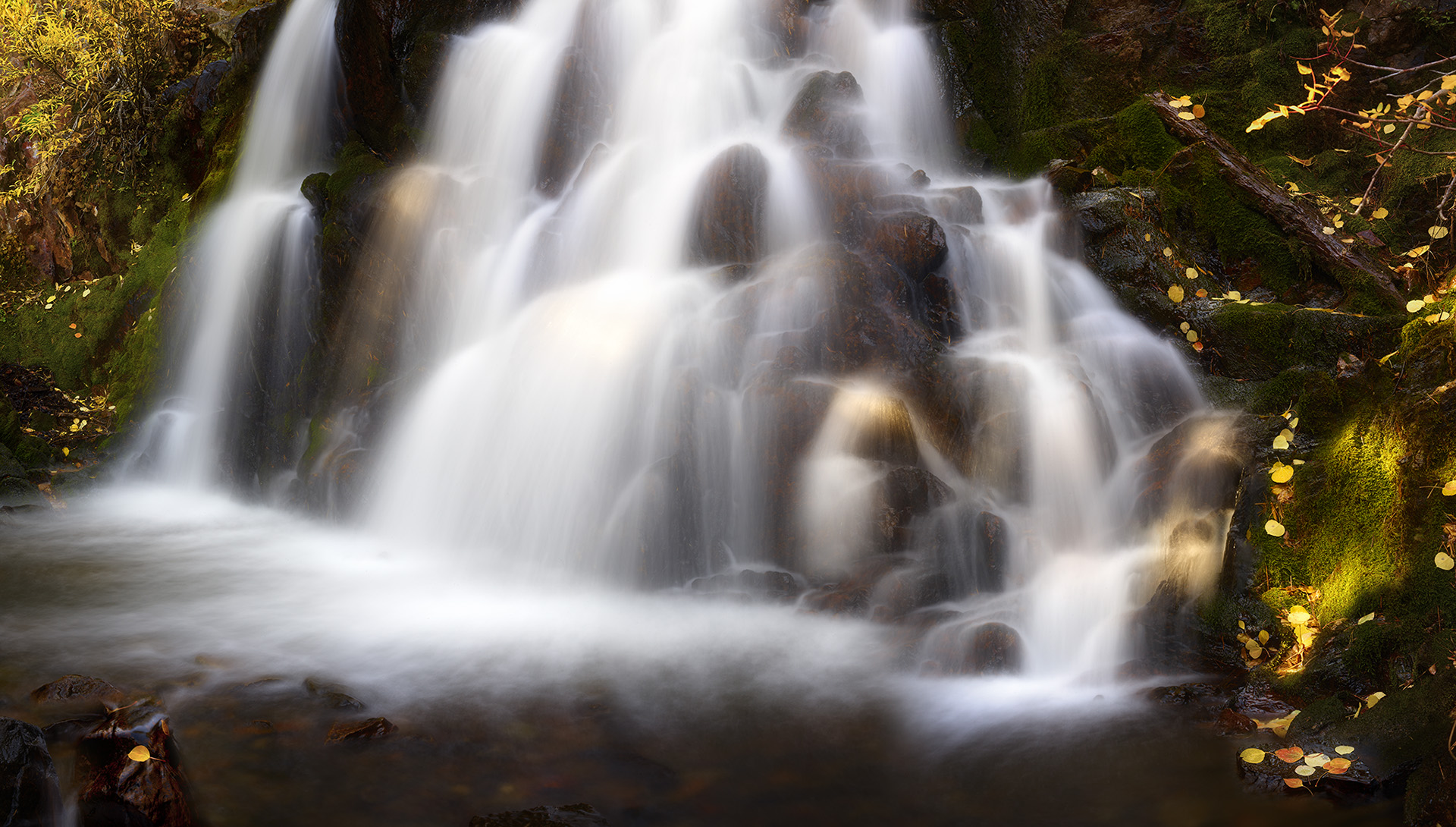 Fine art photograph of a waterfall in autumn.