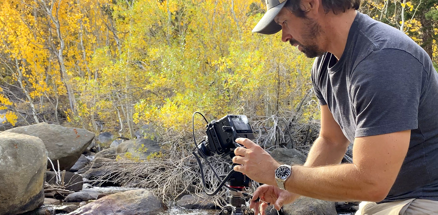 Cheyne Walls wearing a Rolex Submariner Date on a photography shoot