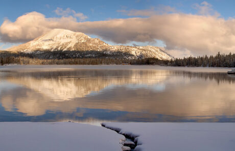 Sunrise photograph of Mammoth Mountain from Lake Mary.